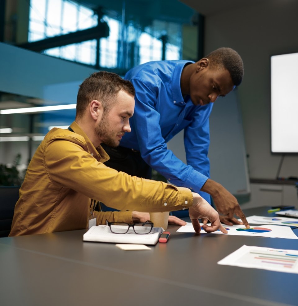 two men working together