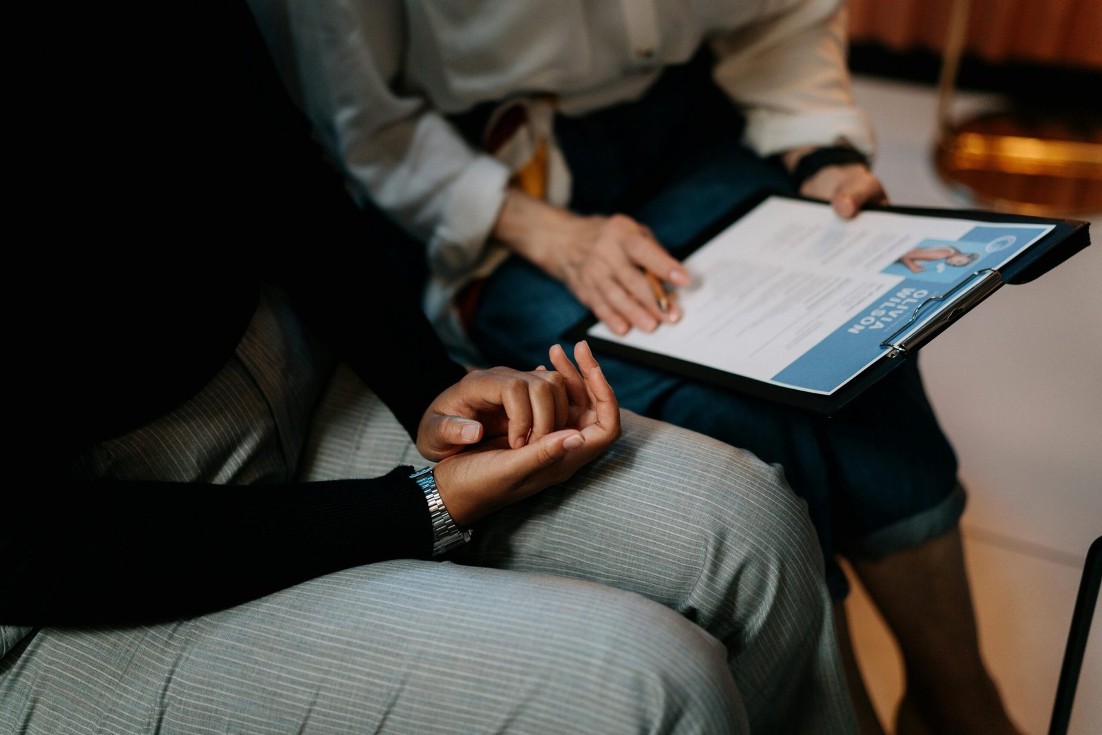 two people going through cv/resume in recruitment process